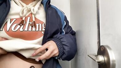 Student girl gets horny in toilet and grabs breasts