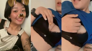 Cô gái tóc ngắn xăm trổ ngực bự xoa ngực và thủ dâm