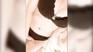 Japanese girl masturbates and pees in her panties