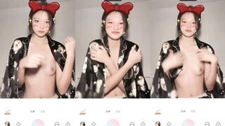 Cute girl with small breasts grabs breasts and takes selfies