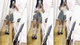 White stockings JK exposes tits and pussy in front of the mirror