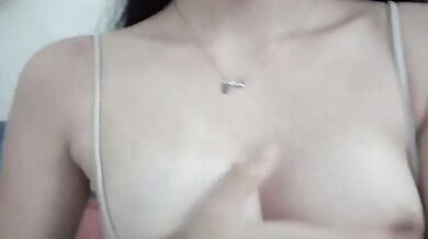 Big tits girl grabs tits and digs pussy and screams
