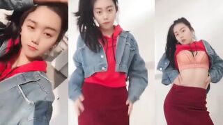 Ponytail girl dancing striptease