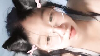 Glasses-Wearing Babe Practices Horseback Riding Nude