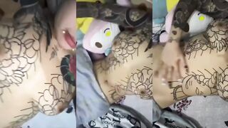 Tattooed girl shows off her figure