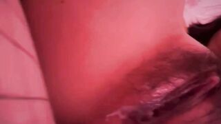 Woman uses vibrating toy for solo pleasure in bed