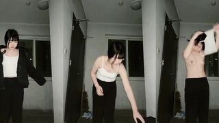 Woman Strips Naked and Takes Selfies in Apartment Hallway