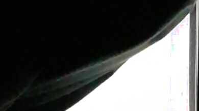 Careless neighbor leaves curtain gap, accidentally exposes herself to entire community