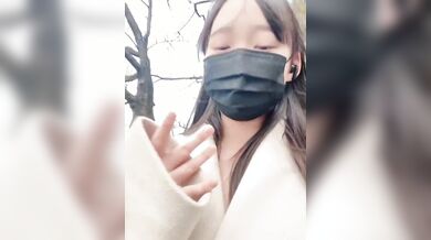 Cute Japanese girl masturbates on the street