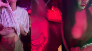 Nightclub beauties show cleavage