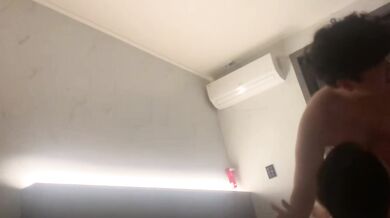 Korean couple takes selfie in hotel