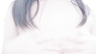 Malaysian escort KMH playing with breasts selfie