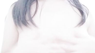 Malaysian escort KMH playing with breasts selfie