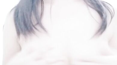 Malaysian escort KMH playing with breasts selfie