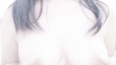 Malaysian escort KMH playing with breasts selfie