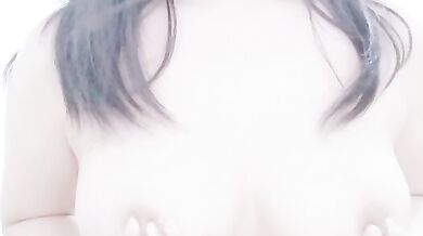 Malaysian escort KMH playing with breasts selfie