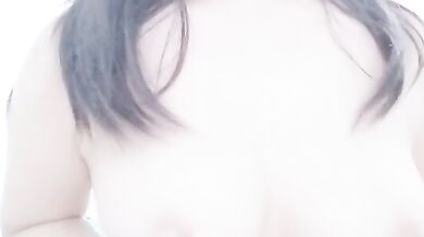 Malaysian escort KMH playing with breasts selfie