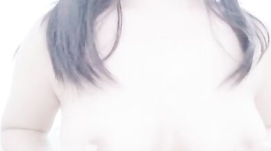 Malaysian escort KMH playing with breasts selfie