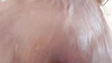 Girl taking a selfie in the bath