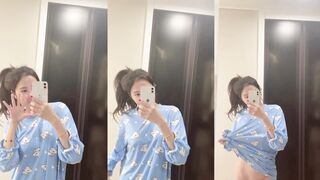 Shanghai beauty takes selfie in front of mirror to show her body