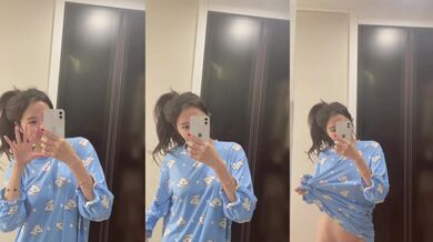 Shanghai beauty takes selfie in front of mirror to show her body