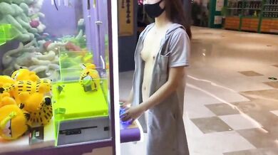 Exposed training in front of claw machine