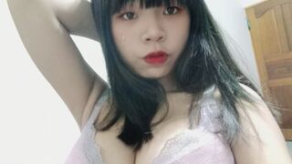 Big tits and a little girl grabs and rubs her breasts