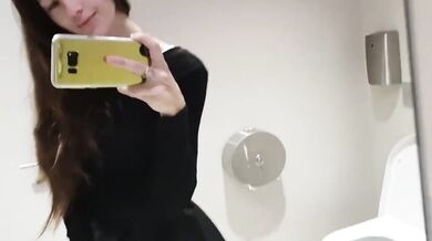 Big tits New Zealand girl takes a selfie in the bathroom and strips and masturbates in front of the mirror