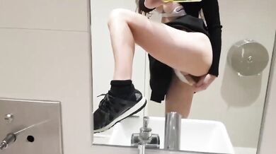 Big tits New Zealand girl takes a selfie in the bathroom and strips and masturbates in front of the mirror