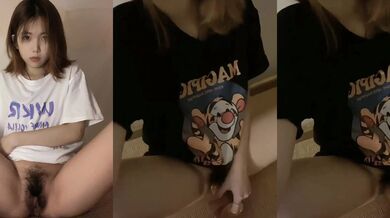 Tattooed bitch masturbates with a fake dick