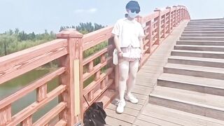 Training JK bitch exposed on the bridge