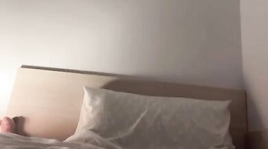 Bitch bites her panties and walks on the bed