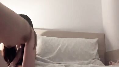 Bitch bites her panties and walks on the bed